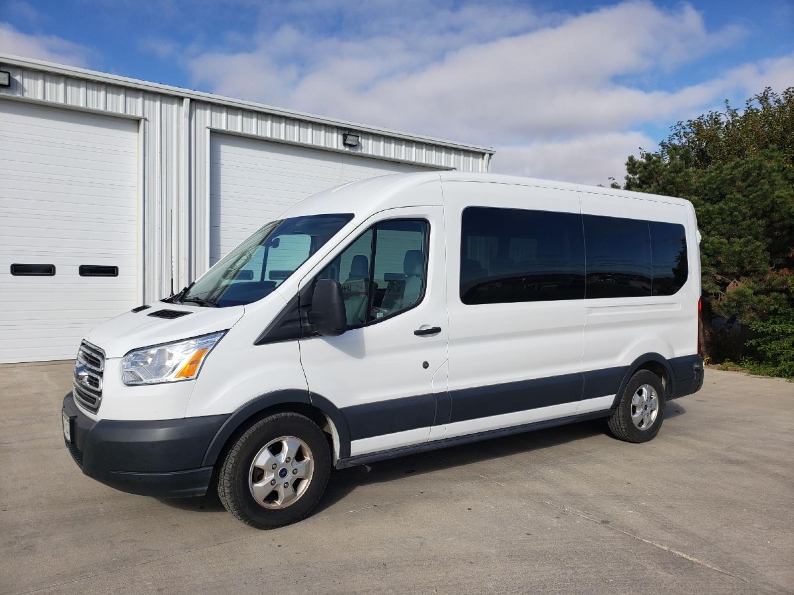 2018 White /Gray Ford Transit 350 Wagon Med. Roof XL w/Sliding Pass. 148-in. WB (1FBAX2CG8JK) with an 3.5L V6 DOHC 24V engine, 6A transmission, located at 1032 South Lincoln Avenue Ste B, York, NE, 68467, (402) 362-5933, 0.000000, 0.000000 - Photo #1